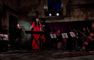 Hypnotic, glamorous, and melancholic: Realma’s theatrical live video