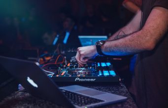 Regenerative Urbanism in Berlin: Clubs as Pioneers of a New Urban Development person playing dj turntable