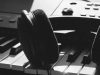 black wireless headphones on gray electronic keyboard