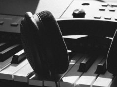 Jeff Mills mixes The Paradox for BBC Radio 6 black wireless headphones on gray electronic keyboard